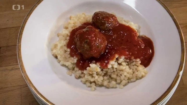 Meatballs with tomato sauce on grains