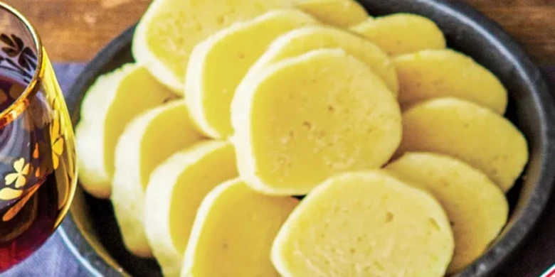 Potato dumplings with tea