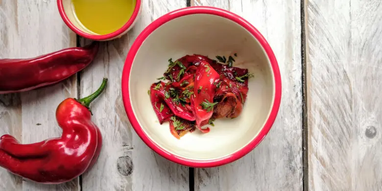Roasted red peppers with herbs and oil