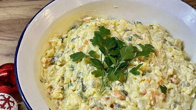 Potato salad with parsley garnish