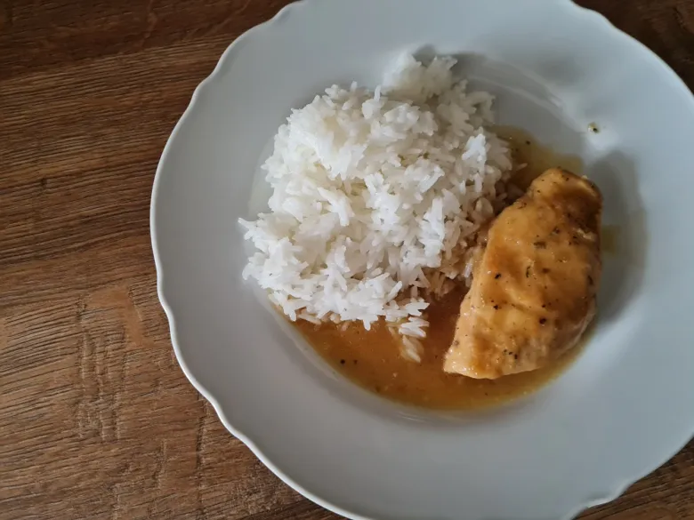 Chicken breast with rice and sauce