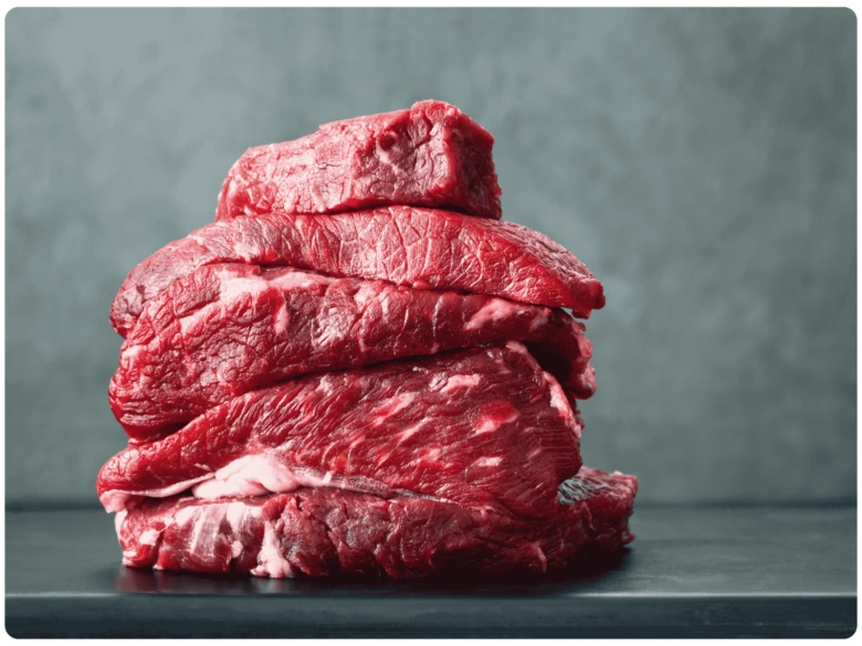 Raw beef steaks stack