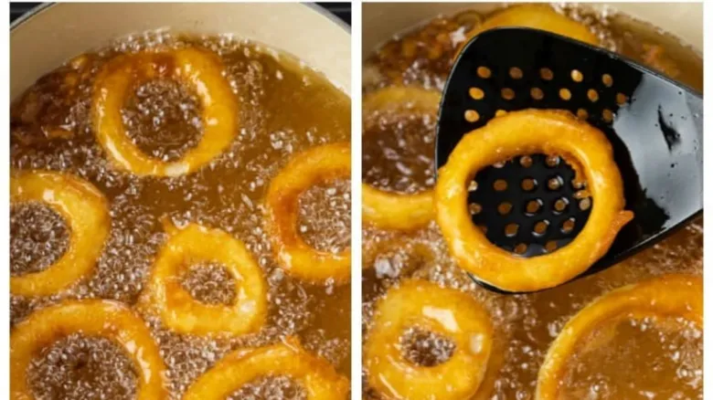 Zlaté cibulové kroužky smažené v horkém oleji.