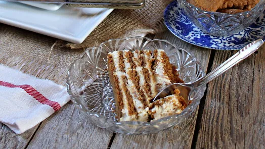 Slice of honey cake with cream