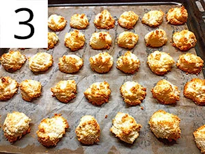 Baked coconut cookies on tray