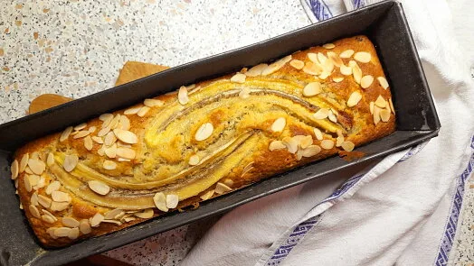 Banana bread loaf with almonds