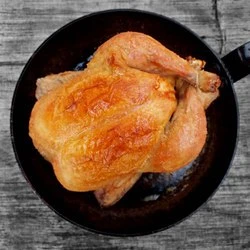 Roasted chicken in pan