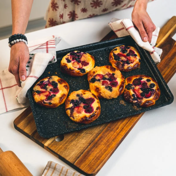 Baked fruit pastries on tray