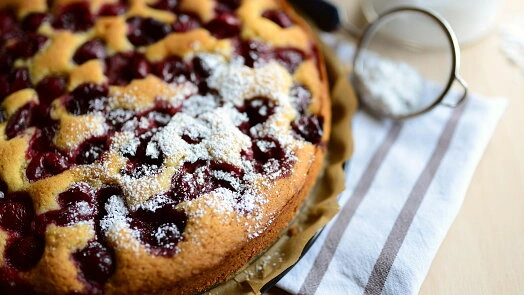 Cherry cake with powdered sugar