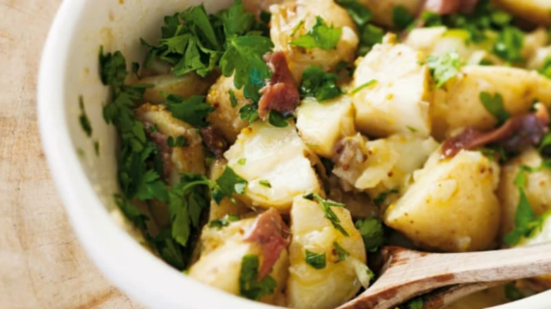 Potato salad with herbs and bacon