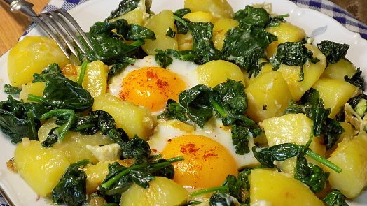 Spinach with eggs and potatoes