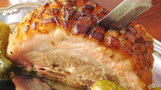 Roasted pork belly with knife