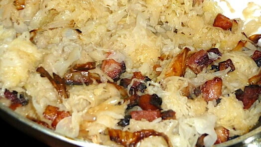 Hot Hungarian pork perkelt dish in frying pan